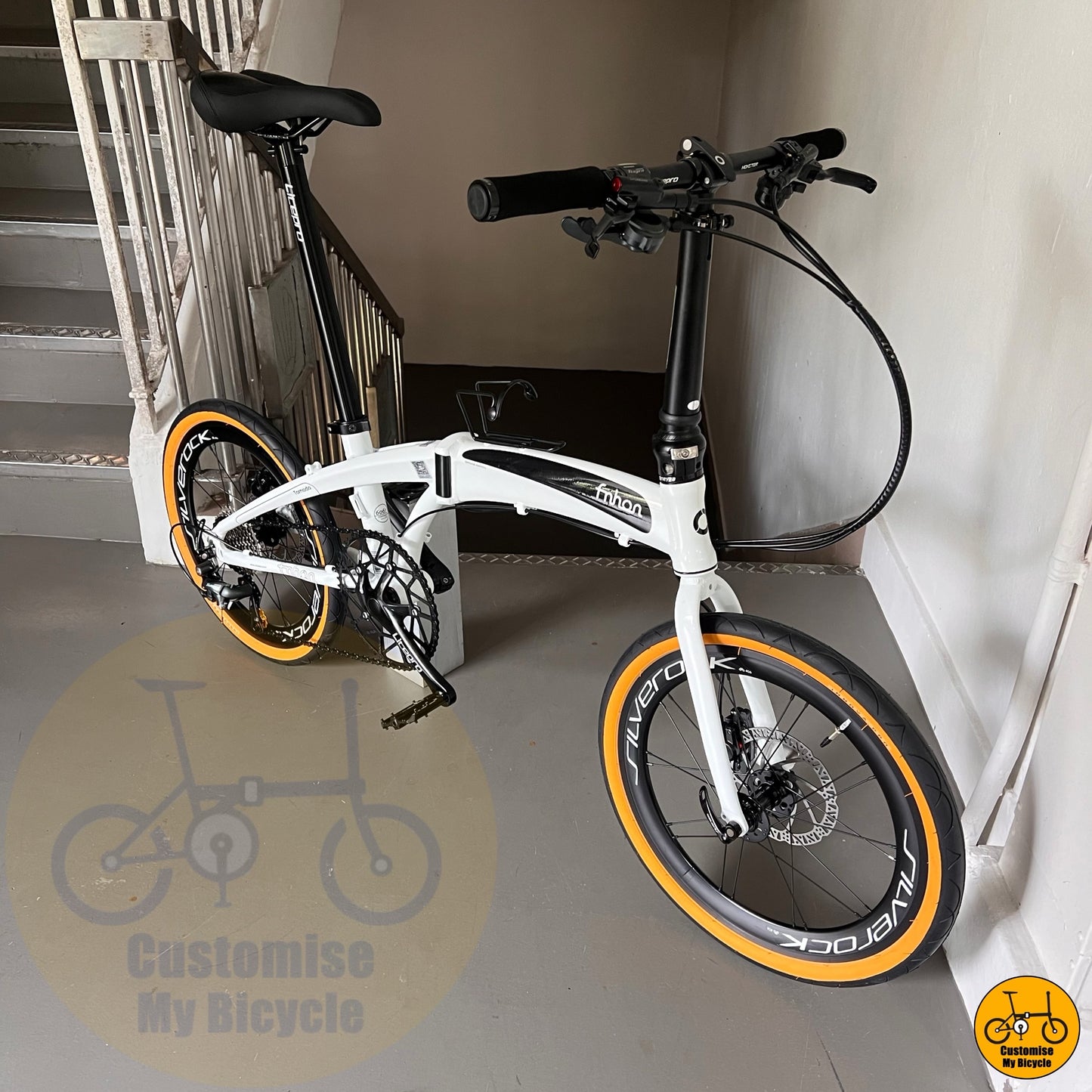 White Fnhon Tornado 20-inch folding bike with Silverock wheelset  
