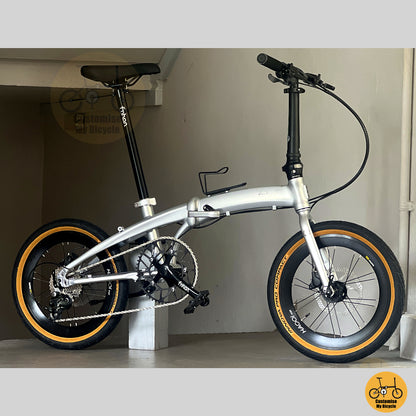 Fnhon Twister 18" Space Silver folding bike in compact folded configuration