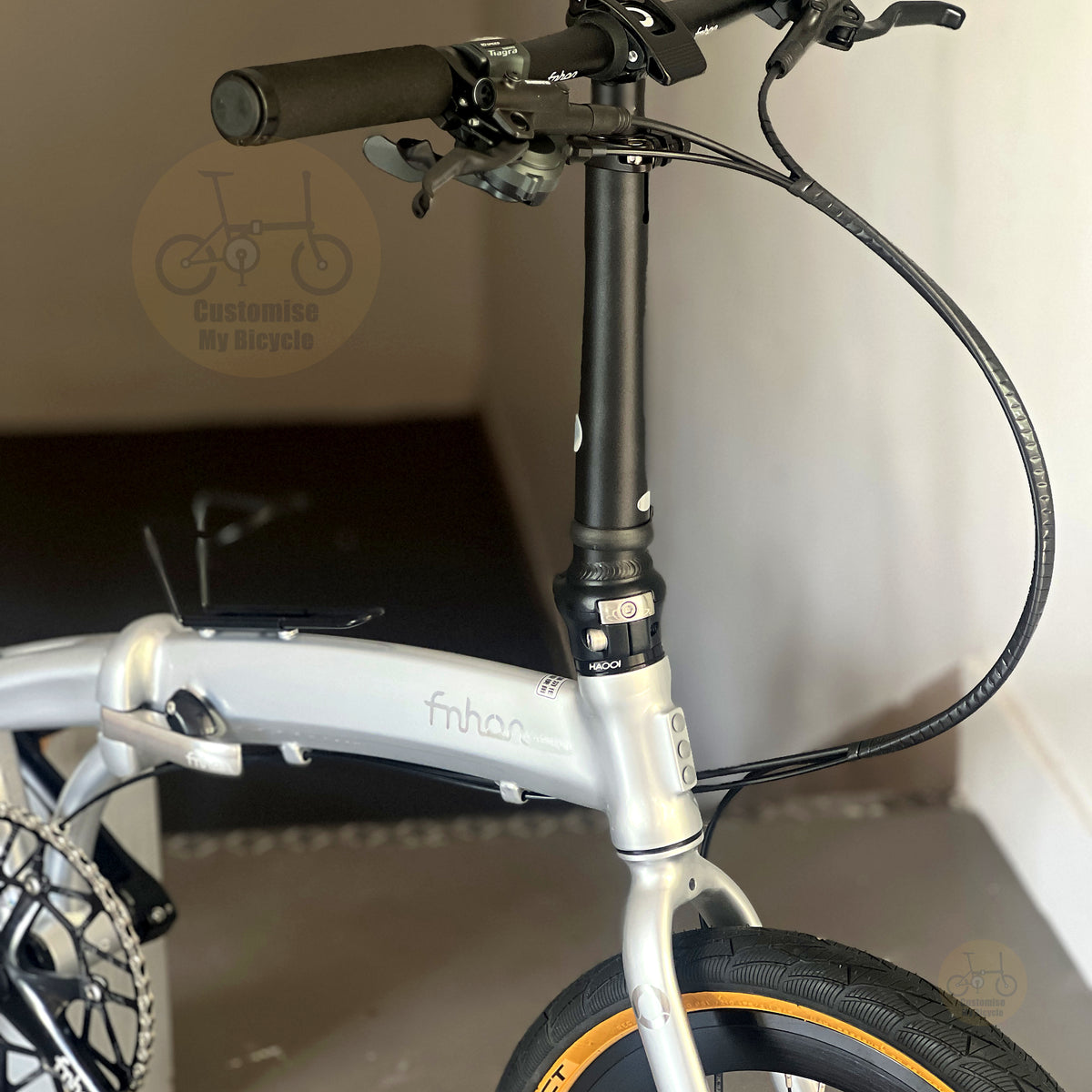 Fnhon Twister 18" Space Silver folding bike with SHIMANO hydraulic disc brake; FNHON telescopic handle post
