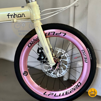 Side view of Fnhon Zephyr 18 inch beige folding bike with Shimano 9 gears and Litepro wheels
