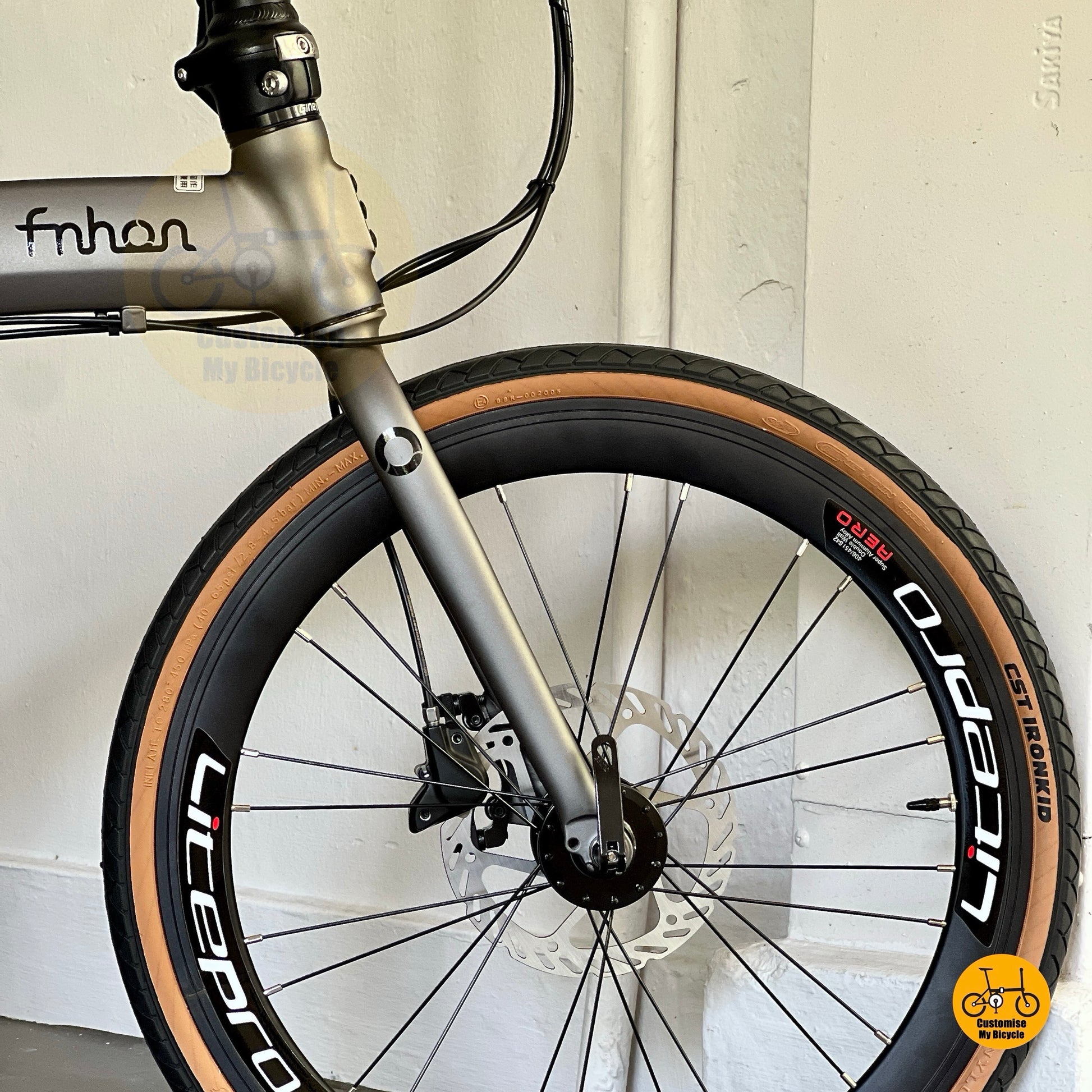 Side view of Fnhon Wind 22 inch Carbon Grey folding bike with Shimano 10 Speed Tiagra gears  
